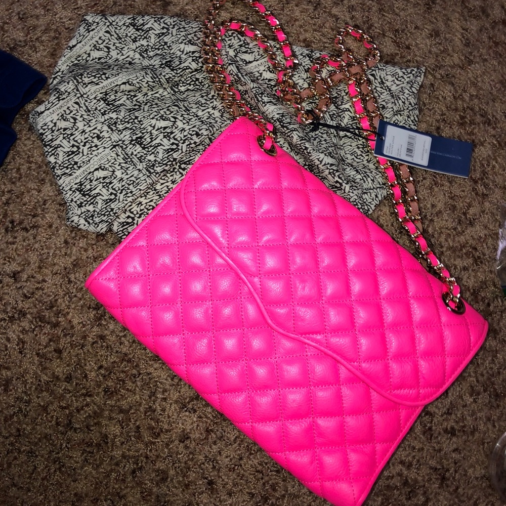 Rebecca Minkoff purse tags on never used